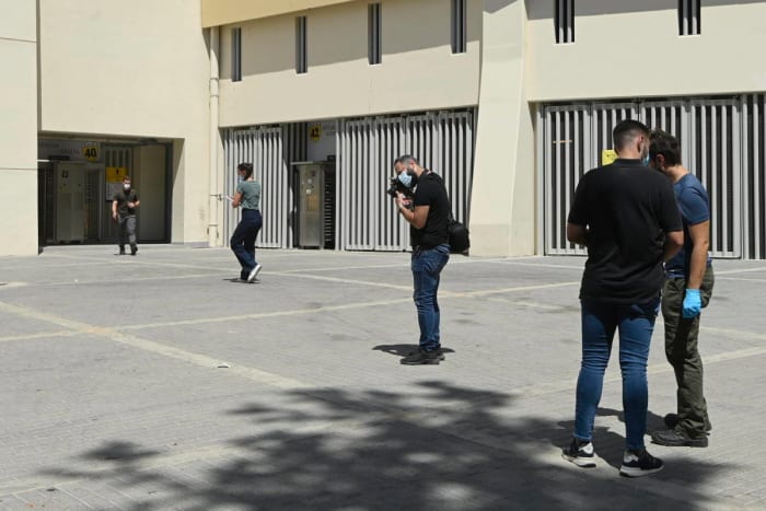 Greek police pictured gathering evidence outside of the Agia Sophia Stadium in Athens after a man was stabbed to death on the eve of a planned Champions League match between AEK Athens and Dinamo Zagreb in August 2023